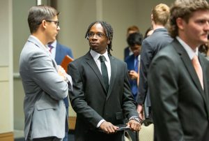 Students talking in line